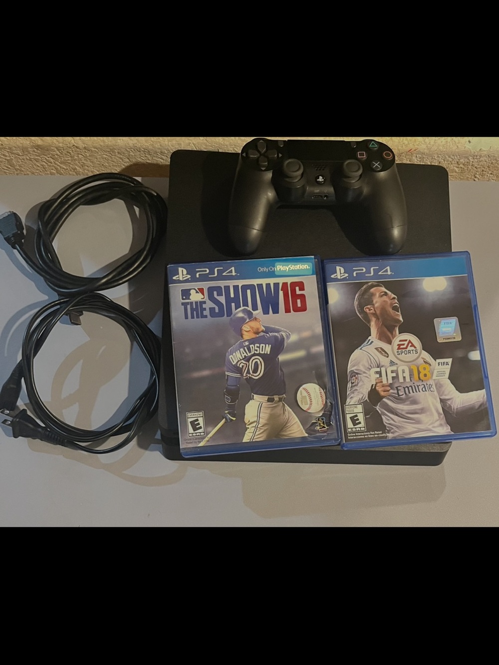 Sony PS4 Slim Black Console Bundle with Controller and Two PS4 Games